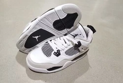 Unleash the perfect blend of style and performance, featuring sleek black leather uppers, classic Air cushioning for...
