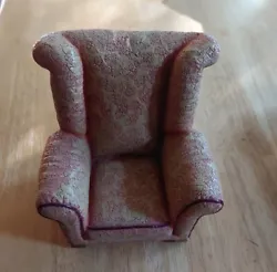 This is a unique piece so Ive included a lot of pictures.  Its a figure or sculpture of an upholstered arm chair. The...