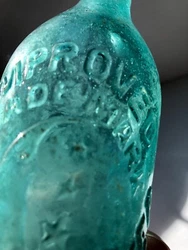 This C.A. Reiners bottle has been dug and only rinsed out with water. If you clean it, youll have a gem of an example!