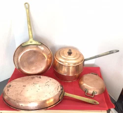 This set of copper pans includes an antique rice cooker with a patent pending date of 1877, as well as three vintage...