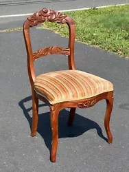 Antique Victorian Walnut Carved Side Chair c. 1870having a nicely carved crest rail and splat. The legs are French...