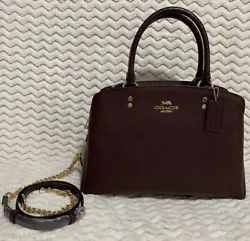 Crossgrain leather and snake-embossed leather. Lillie Carryall. 100% Authentic Coach Bag. Outside open pocket. Handles...