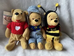 Lot of 3 The Disney Store Winnie the Pooh Plushes (NEW with tags). Condition is 
