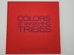 Colours of the Vanishing Tribes Bonnie Young Donna Karan Hardcover   A beautiful red cloth bound hardcover coffee table...