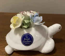Royal Doulton England Bone China Floral Bouquet Sea Turtle. The turtle is white a features gold eyes and tail with a...