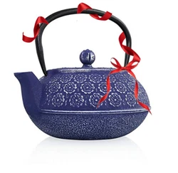Resveralife Lilac Blossom Cast Iron Teapot. The 32 oz. cast iron tea kettle with its intricate artwork that draws...