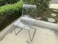 clear plastic chair.