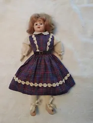 Antique Minerva Tin Head Doll by Buschow & Beck.  This turn of the century doll is 12.5