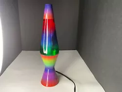 This lava lamp, rainbow colors very fun 14 1/2 inches. Please note that when you plug in your lava lamp, it does take a...
