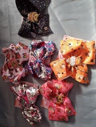 Be the ultimate Jojo Siwa fan with this set of 6 hair bows! These colorful and vibrant bows are perfect for girls of...