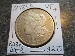 Any yellowing in my pictures is from the lighting and not on the coin, but it has been cleaned. The coin in the picture...