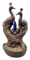 Peacock Backflow Cone Buner. Smoke travels downwards forming a waterfall effect. Must use backflow cones to achieve...