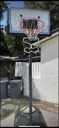 Local pickup only please. Will not ship. . Used portable/ adjustable basketball hoop. Height adjusts from 8-10 feet....