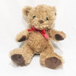 Nice teddy bear with bow. Item: Plush / Stuffed Animal. Color: Brown, Red.