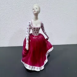 This vintage Royal Doulton figurine, titled 