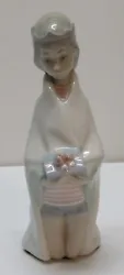Marked on Bottom LLadro Hand Made in Spain as well as marked and stamped with other makers marks. Approx 6-3/4