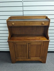 A wonderful maple water bench ca. 1940s obtained from a family estate in central CT. Small imperfections present due to...