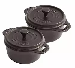 Includes two mini, round cocottes with lids. The elegance and functionality of this Staub mini ceramic cocotte set is a...