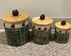 This is for a three piece kitchen canister set. Tight lid closure. Apple top decoration on wood lid. See photos. Local...