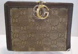 Vintage Gucci Bifold Womens Wallet Canvas & Leather Logo Clasp Made in Italy. This wallet is in good vintage condition...