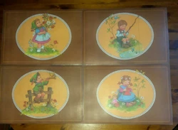 Set of 4 Reversible Plastic Hummel Placemats. Shipped with USPS Priority Mail. This is a set of four reversible plastic...