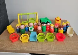This vintage Fisher Price Little People lot includes 14 figures and accessories such as a swing and trike. The...