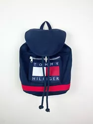 This vintage backpack from Tommy Hilfiger is a must-have for any 90s enthusiast. The bag features a big logo spell-out...