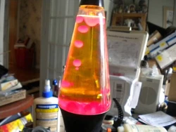 very nice one   the lava flows smoothly     great neutral base   black   vintage for sure
