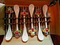 Original box in used shape. each spoon has a fierce demon mask on the handle painted in bright colors and great detail....