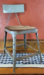 Has Adjustable Seat Height as Well as Adjustable Back Rest Height. •Seat Height- 17.5