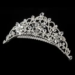 Floral and sparkling, this tiara comb is a delicious alternative to the full tiara. The piece sparkles with Swarovski...