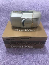 Nikon Lite Touch Zoom 130 ED AF 35mm Point & Shoot Film Camera. I have installed fresh battery in the camera and shot a...