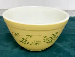 Shenandoah Pyrex Bowl, #401, 750 ML.  Yellow with Green flower and leaf design.  It is without chips and cracks.  It...