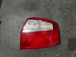 2002-2005 AUDI A4 SEDAN REAR RIGHT PASSENGER SIDE TAIL LIGHT LAMP OEM 177823. Condition is 