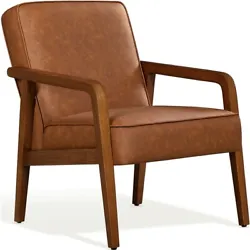 【Mid-century Modern Vibe】The streamlined silhouette and sculptural wood legs of this living room chair strikes a...