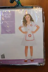 Brand new girls nurse costume 3 pieces - dress, apron and hat headband. 