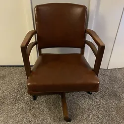 Vintage MCM Brown Leather Swivel Office Bankers Chair Leather is in good condition Some minor scratches on wood. Chair...