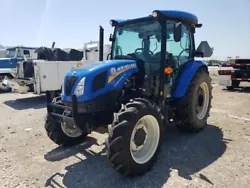 Up for sale is a well-maintained 2020 New Holland Workmaster 75 tractor in a striking blue color. This versatile...