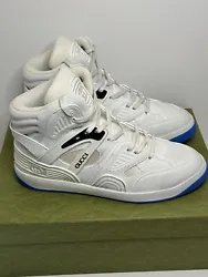 Step out in style with these brand new Gucci shoes! The basket high design in white with blue accents is sure to turn...