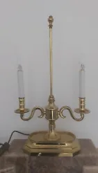 This vintage French Boulette lamp is made of solid brass, giving it a luxurious and elegant feel. It features a corded...