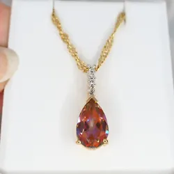 Sunrise topaz pendant with diamond bail.