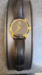 38mm gold overstainless steel case. This watch is in very nice like-new condition. Black embossed dial with a black...