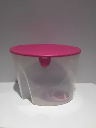 This is aTupperware FIFO First In First Out Cereal Storage Container with Pink Lid #4002A. Container is clear with Pink...