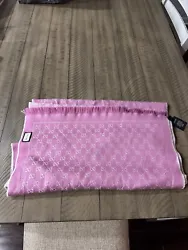 100% authentic beautiful Gucci scarf pink g monogram print wool condition is used but in excellent shape I do not see...