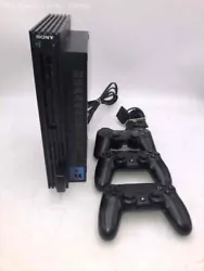 Item: A Sony Playstation 2 with related accessories.