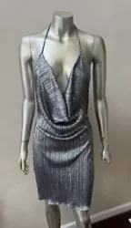 Sexy and flirty Halter dress! Waist 27 in. Length 40 in. -Great condition.