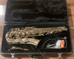 Saxophone Cecilia Gold Tone With Hard Shell Case. Condition is Used. Shipped with USPS Priority Mail.