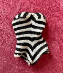 Barbie’s beautiful black and white zebra swimsuit. I have listed two.