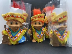 Introducing the All Around The World Troll México, a 5-inch Russ brand doll 3 with bright orange hair and 2 with red...