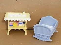 Fisher Price Loving Family dollhouse Everything for Baby. blue cradle with a white blanket inside. yellow changing...